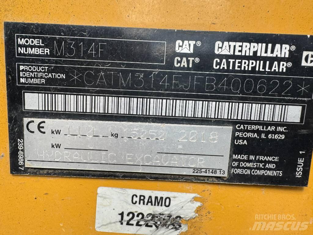 CAT M314F Pelle sur pneus