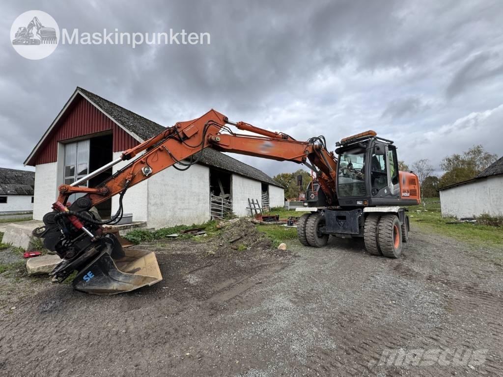Hitachi ZX 140 W-3 Pelle sur pneus
