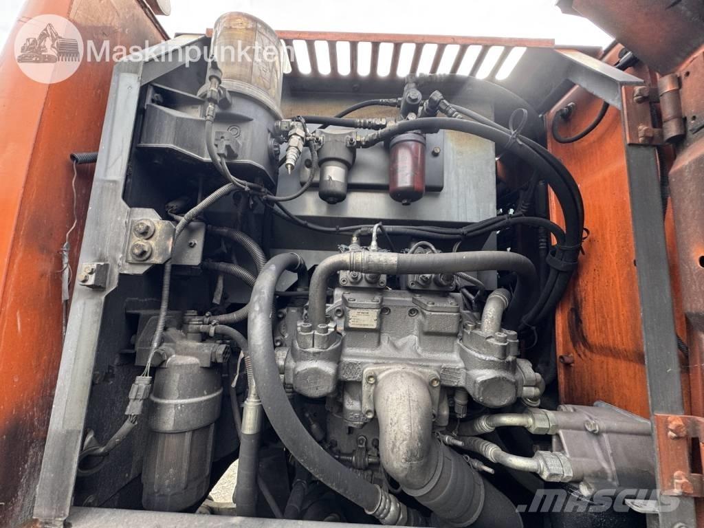 Hitachi ZX 140 W-3 Pelle sur pneus