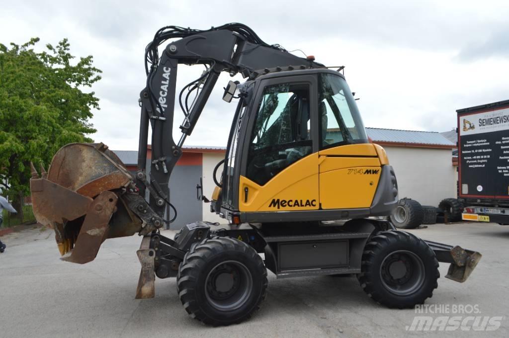  MECALC 714MWE Pelle sur pneus