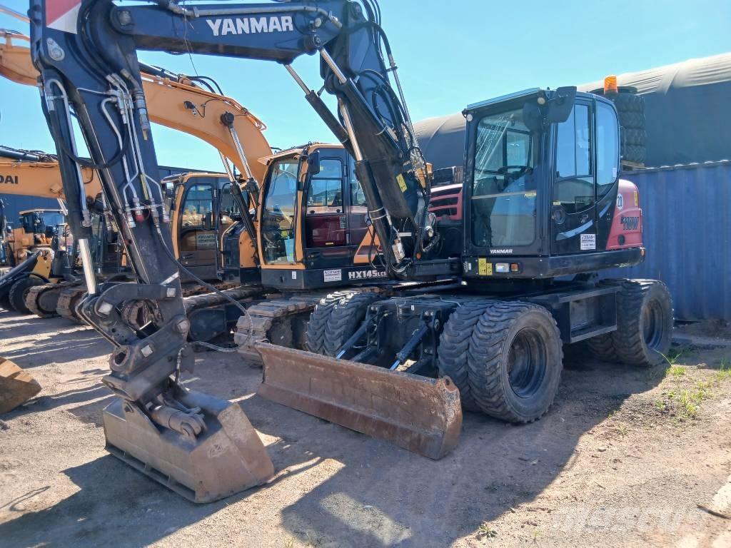 Yanmar B 110 W Pelle sur pneus