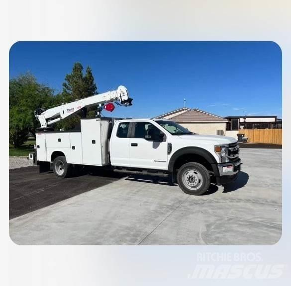 Stellar 7630 Camion plateau ridelle avec grue