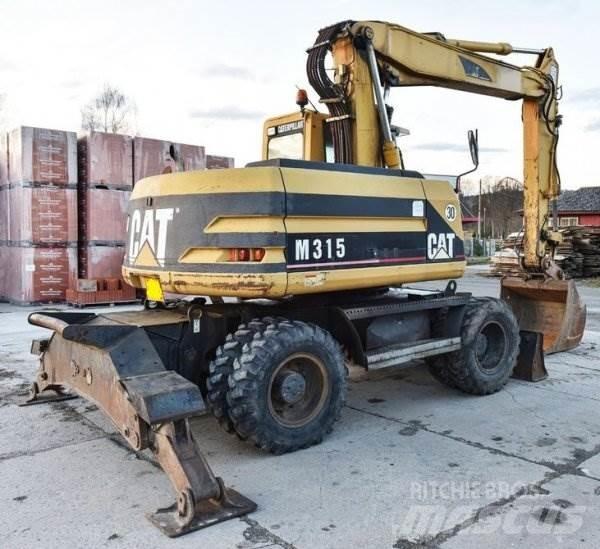 CAT M 315 Pelle sur pneus