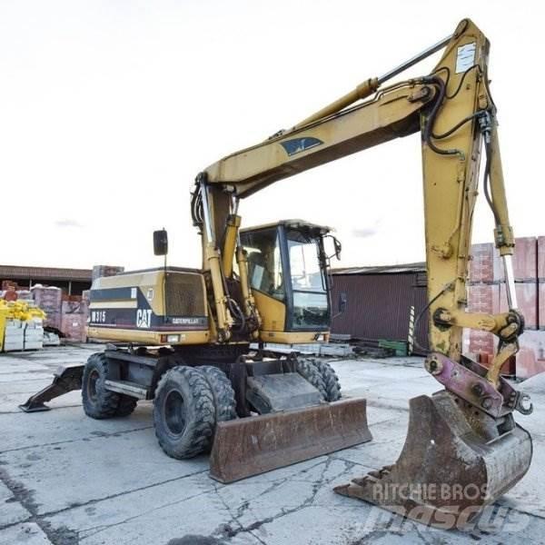 CAT M 315 Pelle sur pneus