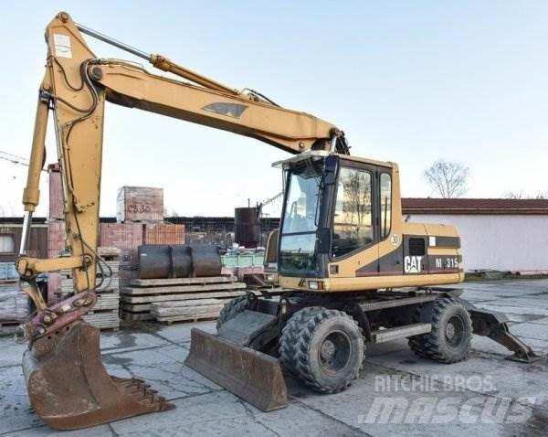 CAT M 315 Pelle sur pneus