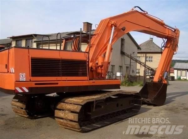 Unex DH 421 Pelle sur chenilles