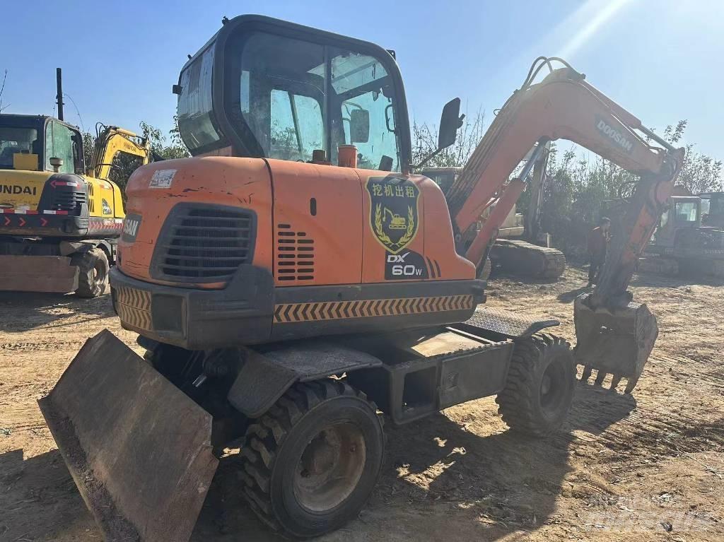 Doosan DX60W Mini pelle < 7t