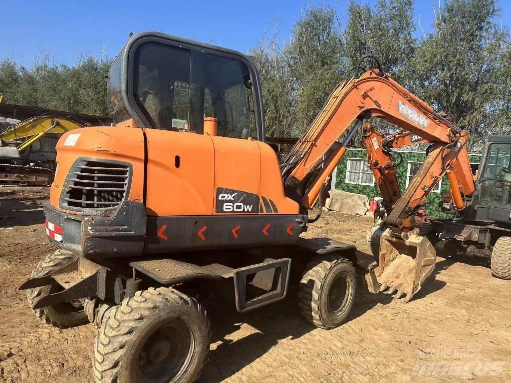 Doosan DX60W Mini pelle < 7t