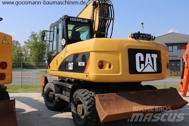 CAT M 315 D Pelle sur pneus