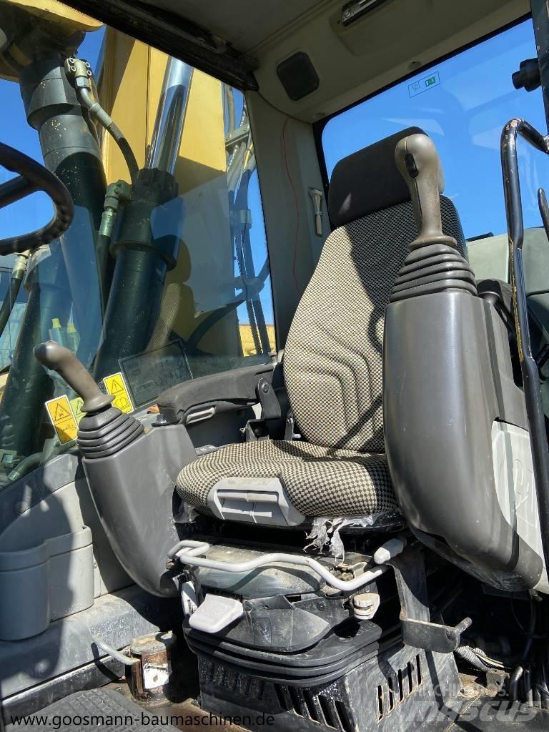 CAT M 315 D Pelle sur pneus