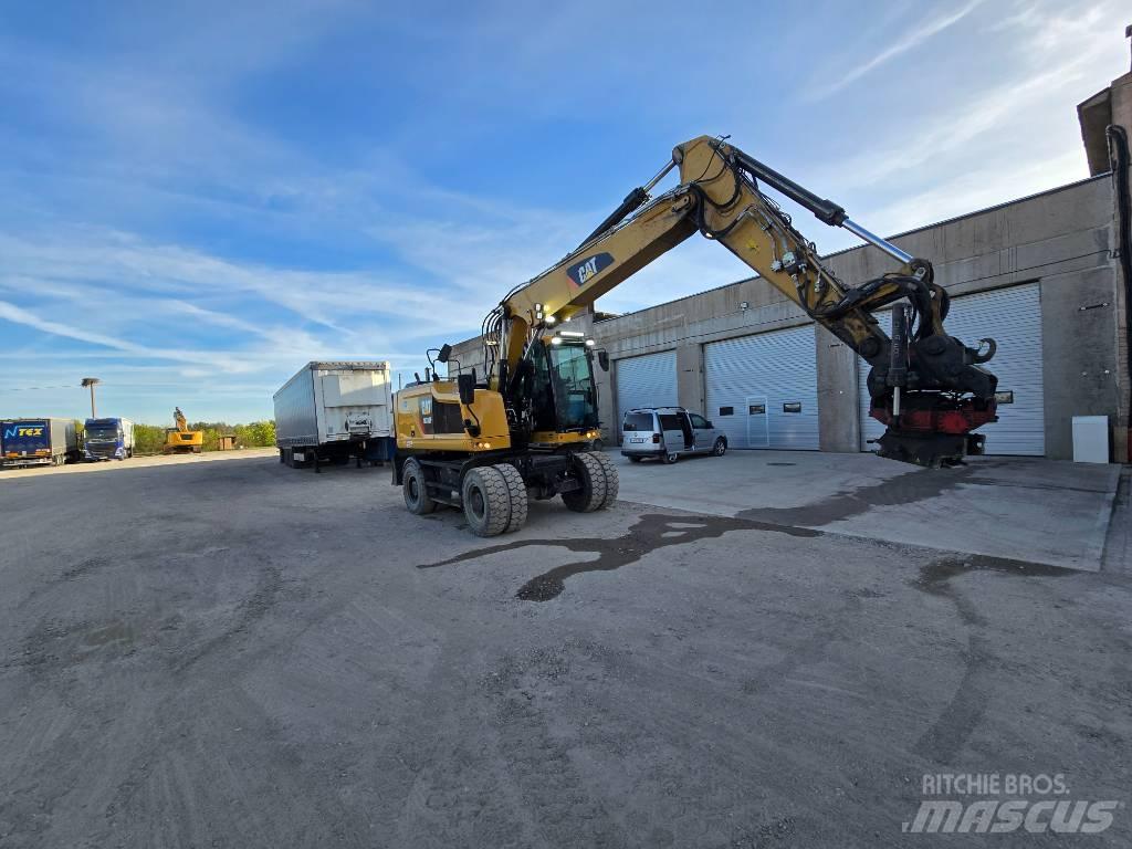 CAT 318 Pelle sur pneus