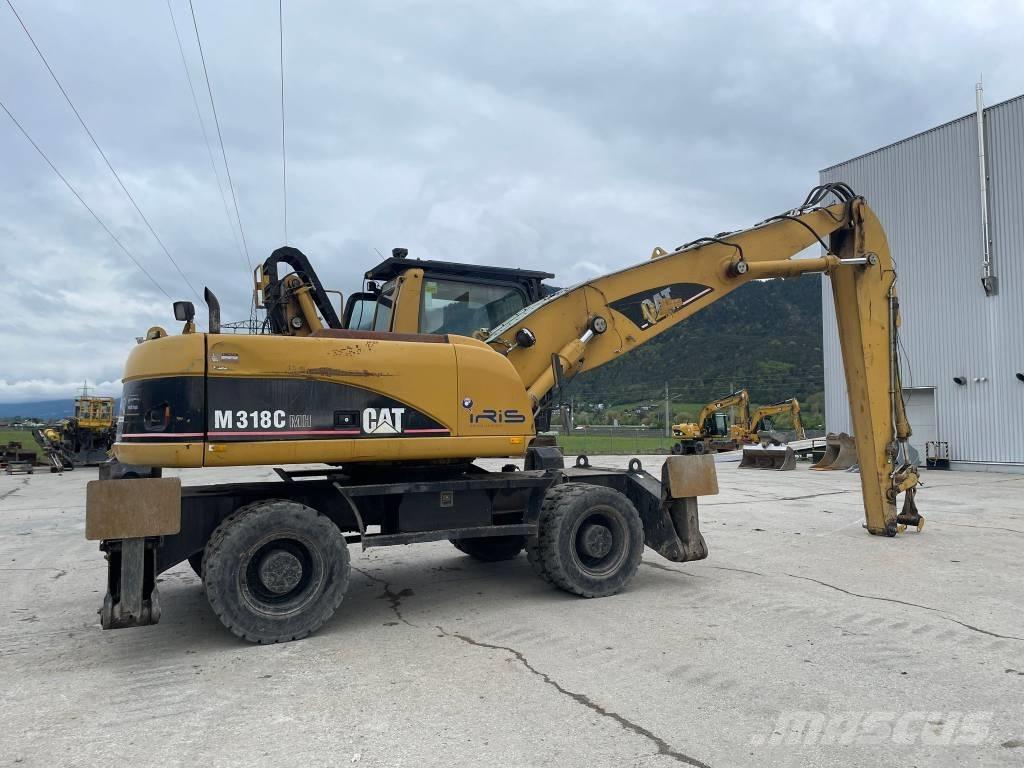 CAT M 318 C MH Pelle à déchets