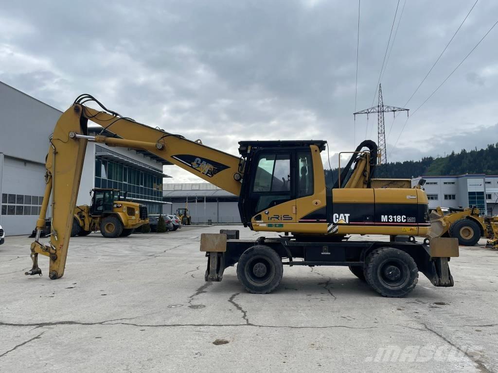 CAT M 318 C MH Pelle à déchets
