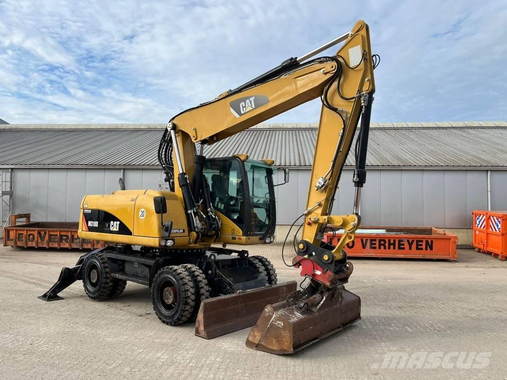 CAT M 318 D Pelle sur pneus