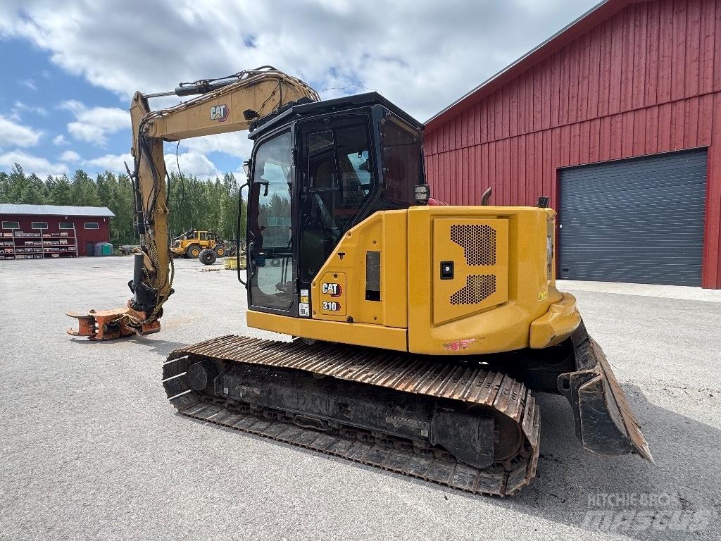 CAT 310-07 Pelle sur chenilles