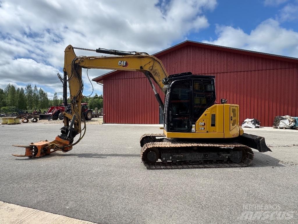 CAT 310-07 Pelle sur chenilles