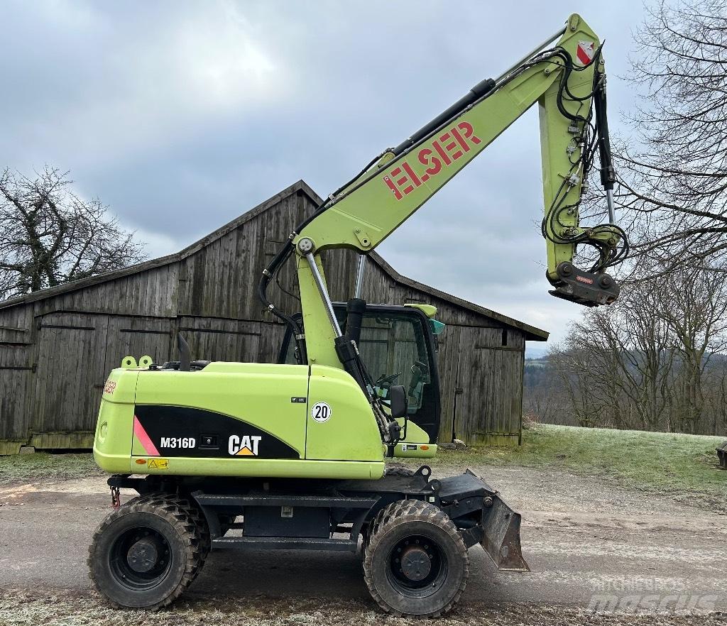 CAT M 316 D Pelle sur pneus