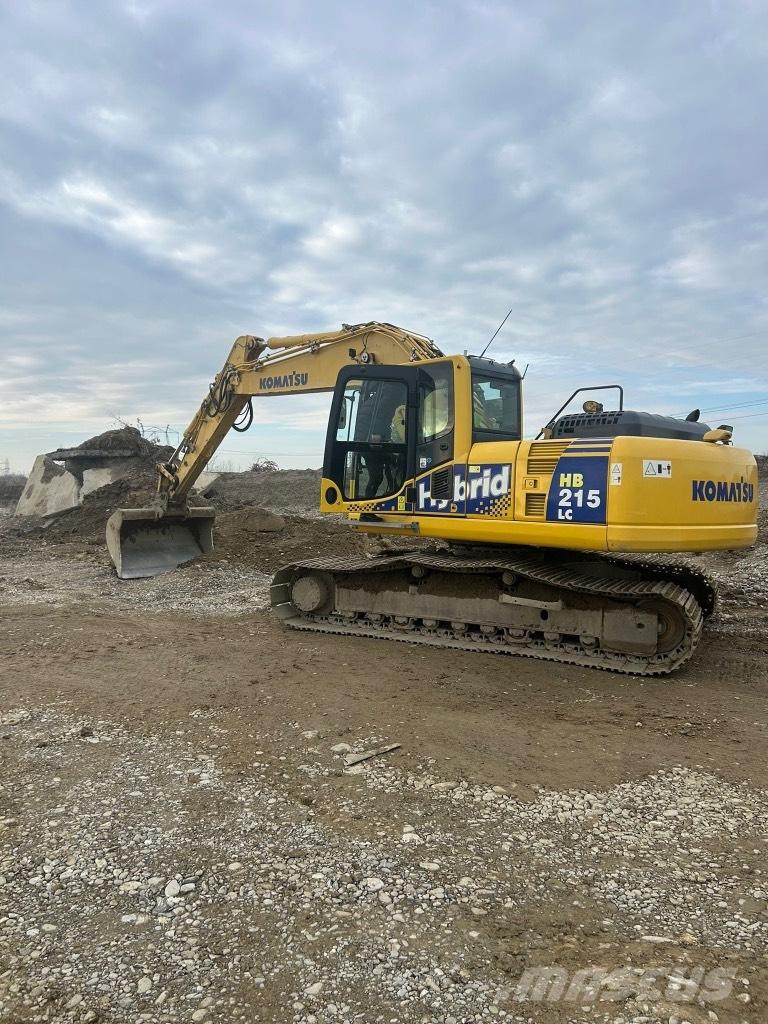 Komatsu HB 215 LC-1 Bras et Godet