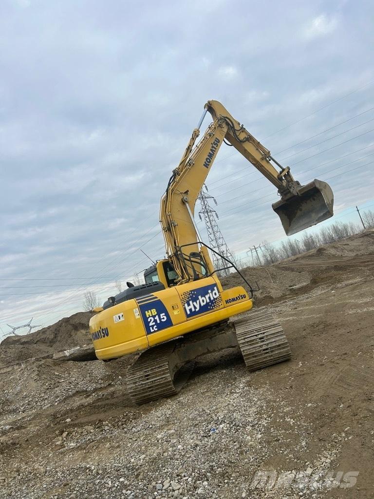 Komatsu HB 215 LC-1 Bras et Godet