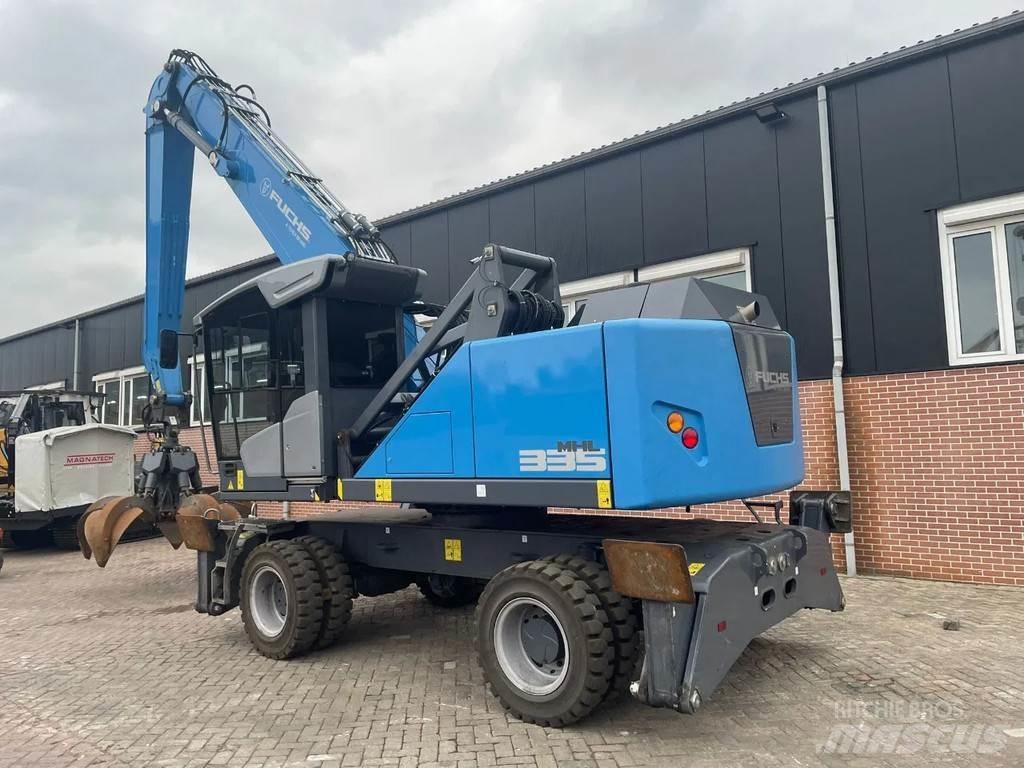 Fuchs MHL335 Pelle sur pneus