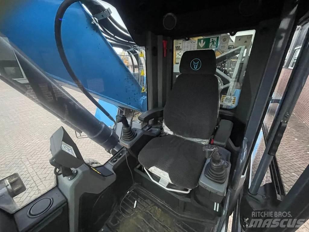 Fuchs MHL335 Pelle sur pneus