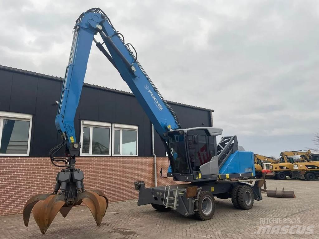 Fuchs MHL335 Pelle sur pneus