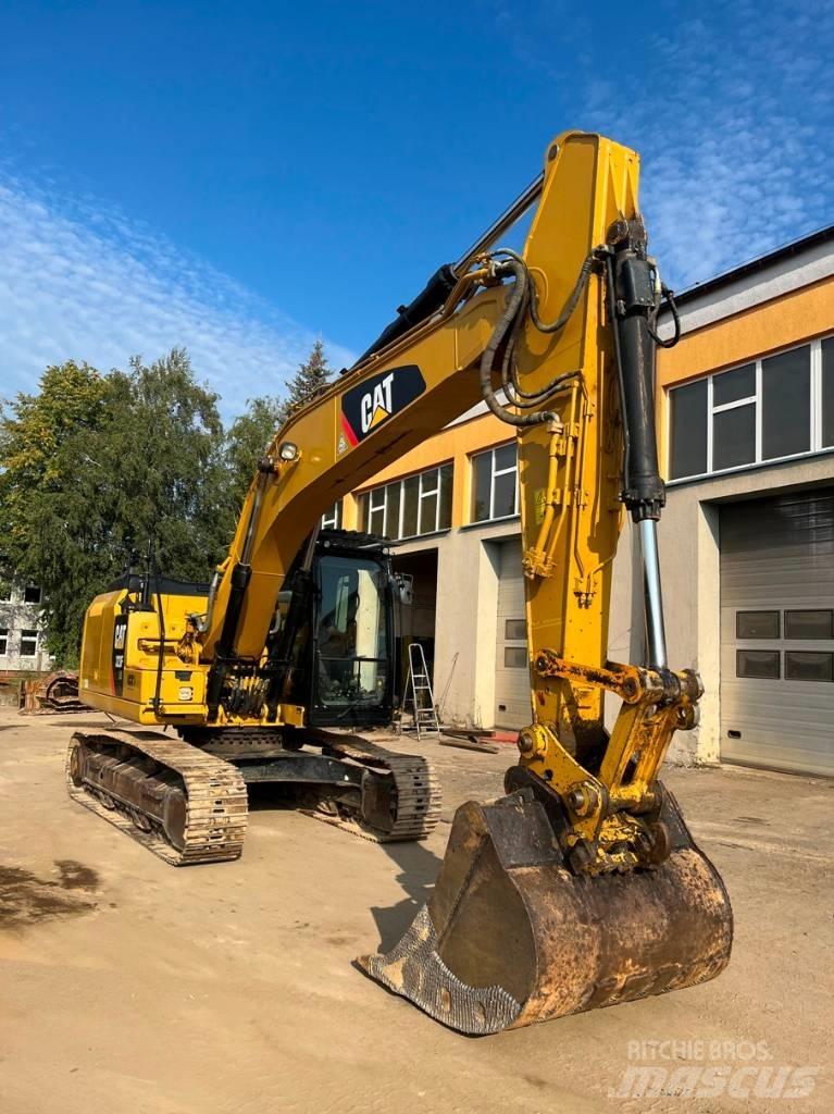 CAT 323 F LN Pelle sur chenilles