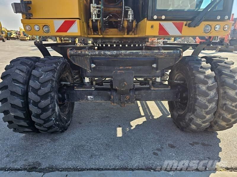 CAT M320F Pelle sur pneus