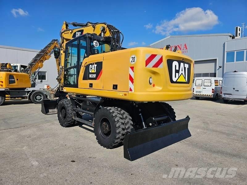 CAT M320F Pelle sur pneus