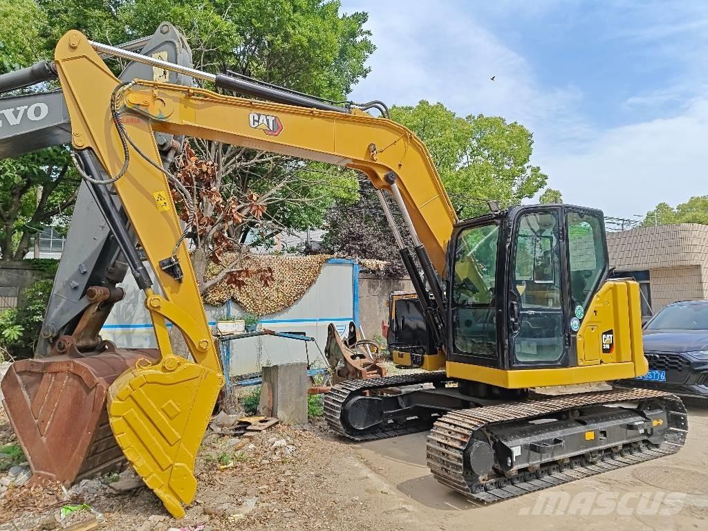 CAT 310 Pelle sur chenilles