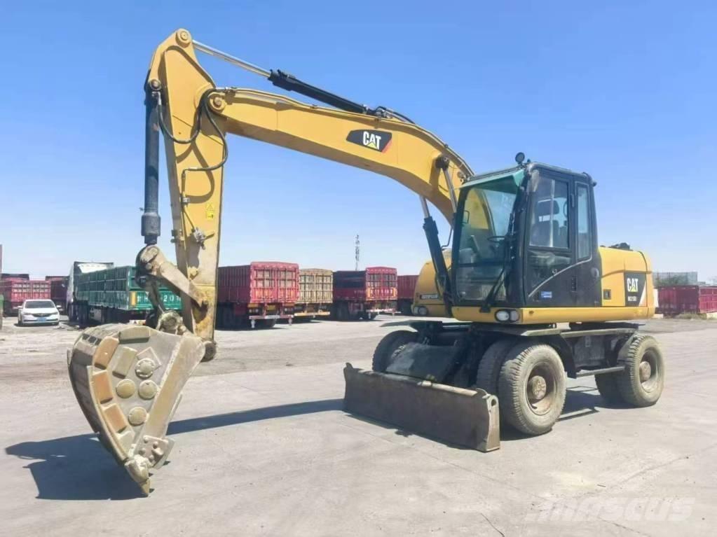 CAT M315D2 Pelle sur pneus