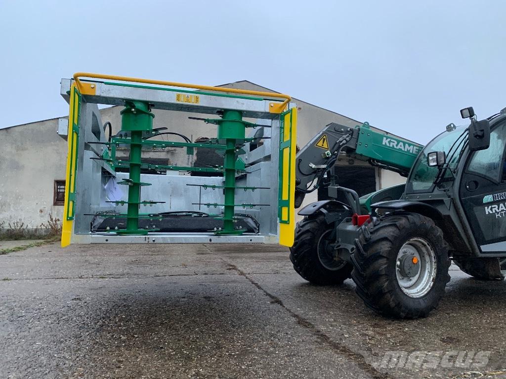  Spread-a-Bale Mini Dérouleuse, pailleuse