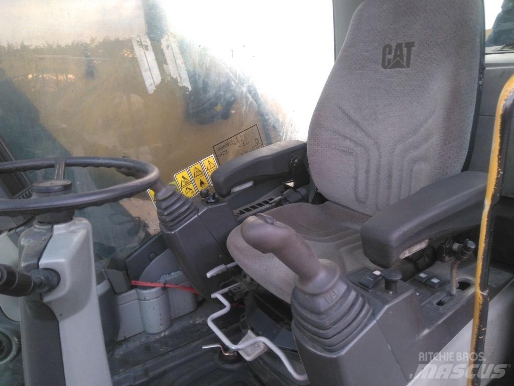 CAT M 322D MH Pelle à déchets