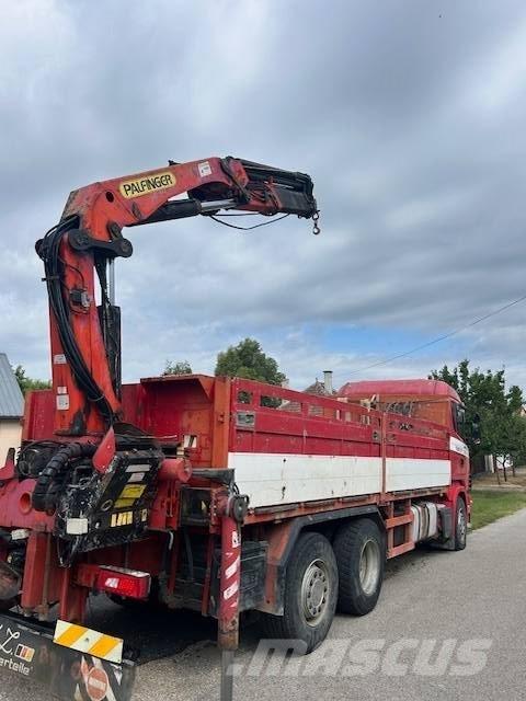 Scania R 114 Camion plateau ridelle avec grue