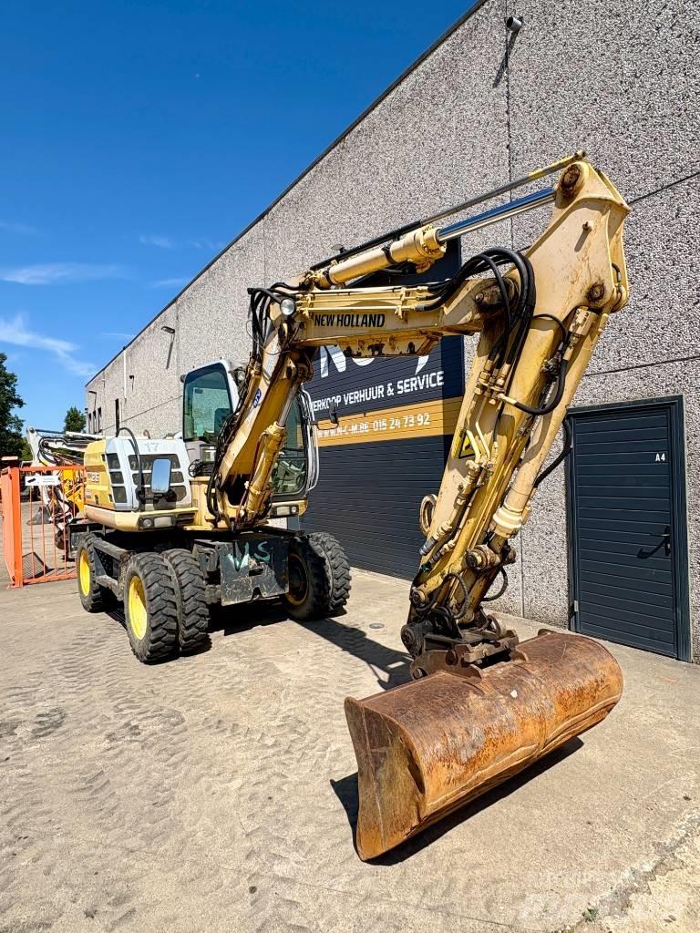 New Holland MH 2.6 Pelle sur pneus