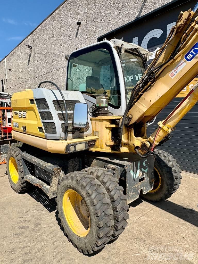 New Holland MH 2.6 Pelle sur pneus