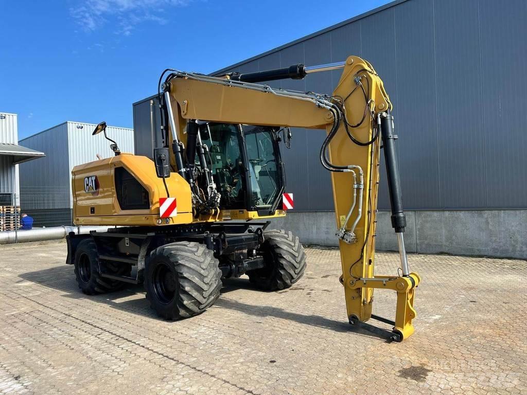 CAT M318-07 Pelle sur pneus