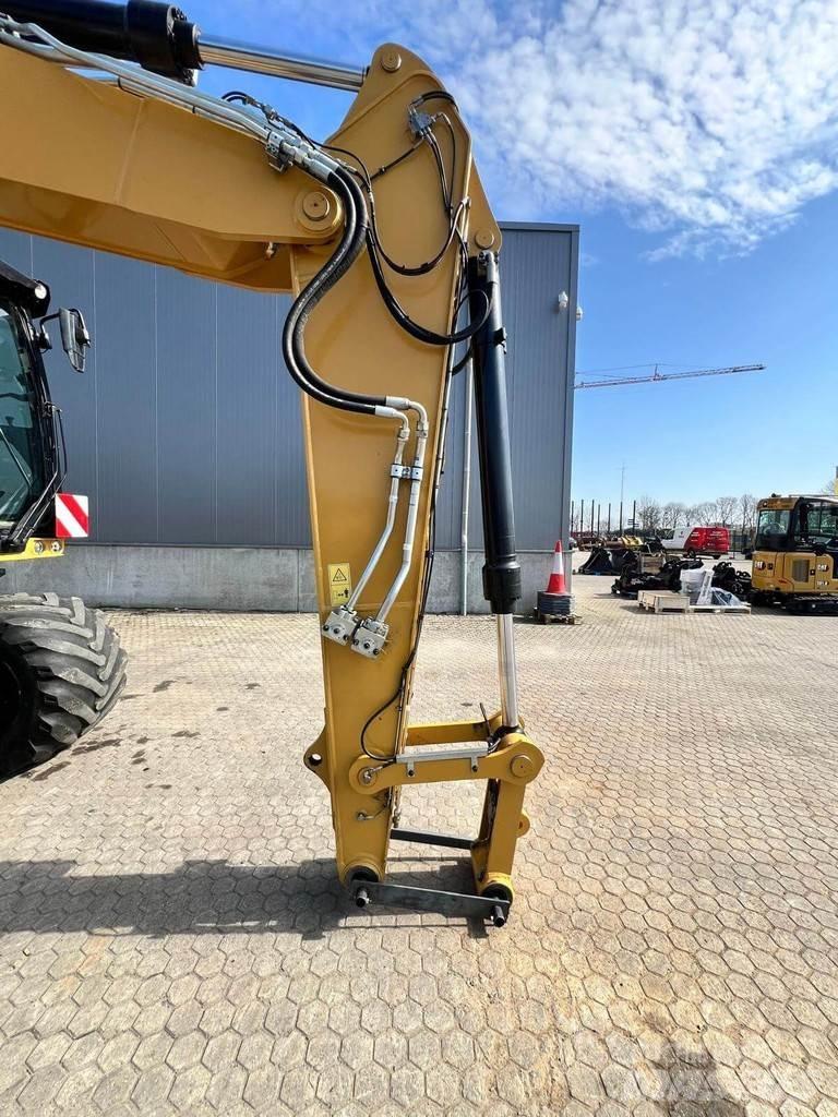 CAT M318-07 Pelle sur pneus