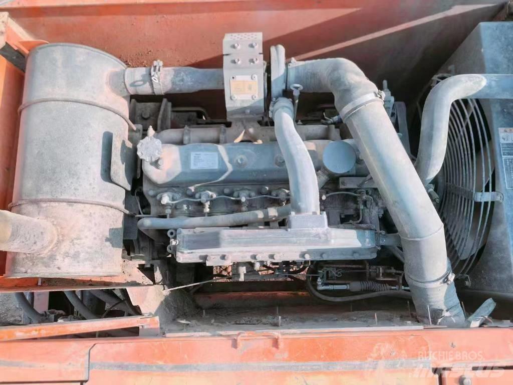 Doosan DH 210 W Pelle sur pneus