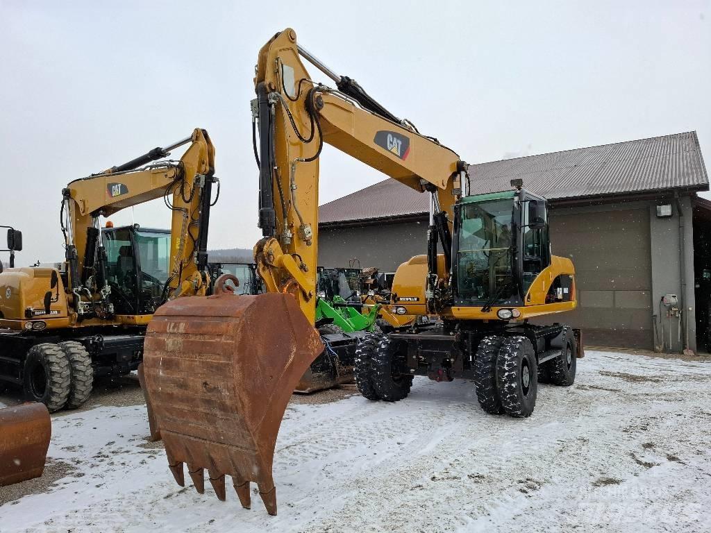 CAT 316 D Pelle sur pneus