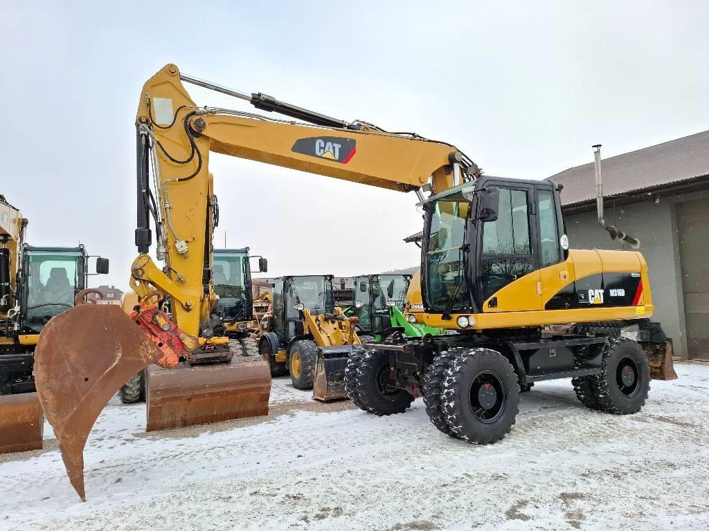 CAT 316 D Pelle sur pneus
