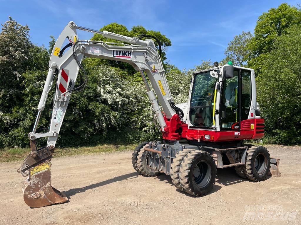Takeuchi TB 295 W Pelle sur pneus