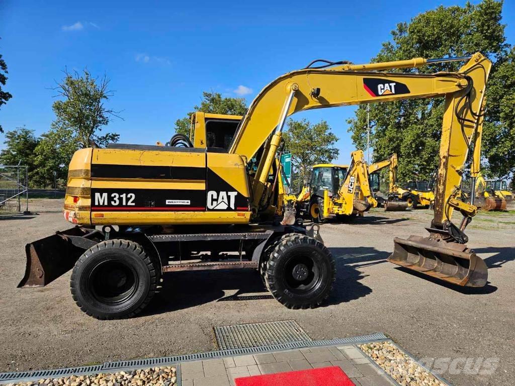 CAT M 312 Pelle sur pneus