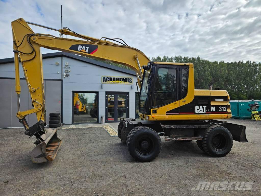 CAT M 312 Pelle sur pneus