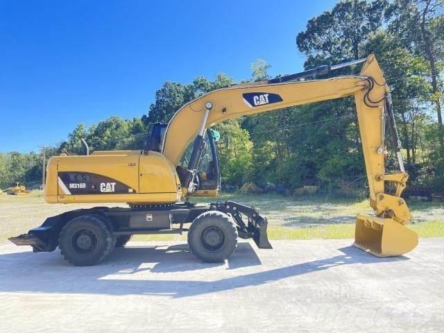 CAT M316D Pelle sur pneus