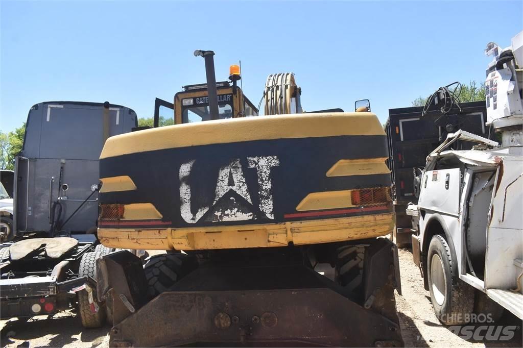 CAT M318 Pelle sur pneus