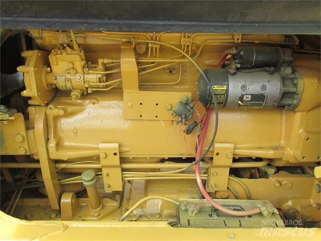 John Deere 570 Niveleuse
