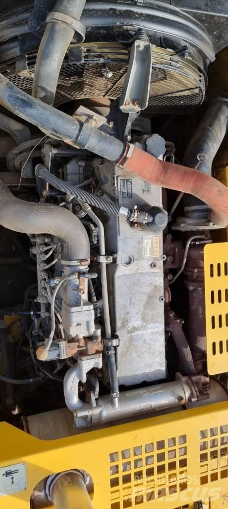 New Holland E 385 Pelle sur chenilles