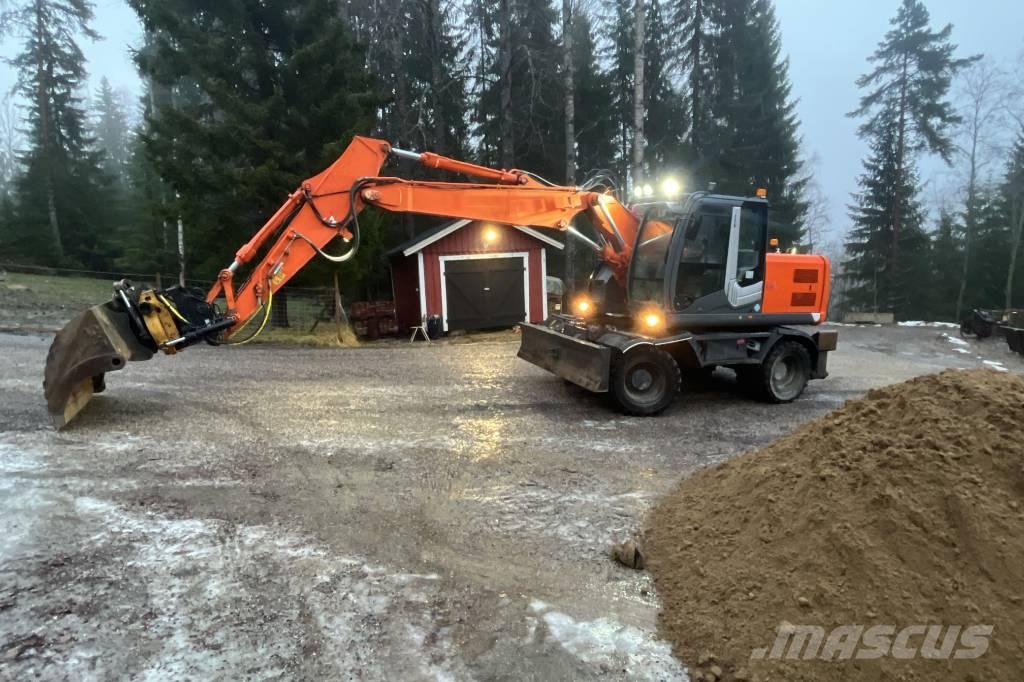 Hitachi ZX 140 W-3 Pelle sur pneus