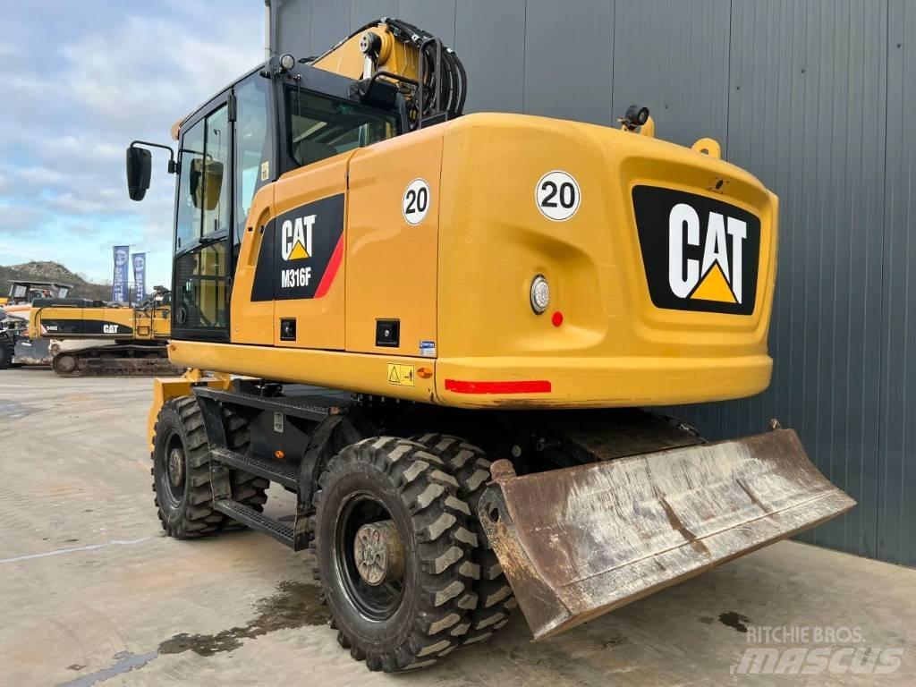 CAT M316F Pelle sur pneus